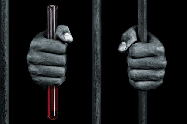 Prisoner holding bars and a test tube