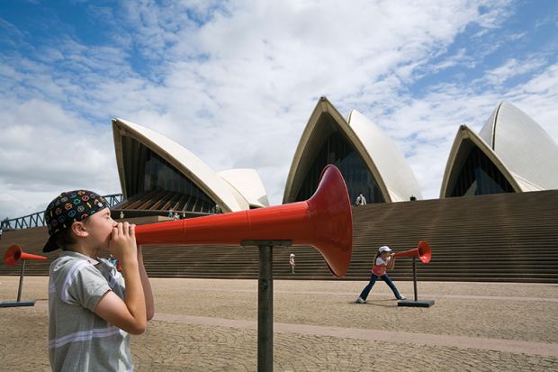 Kids shout through megaphones at the Opera House during the Sydney Festival. Australia