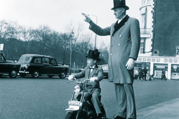 Man with boy on bike