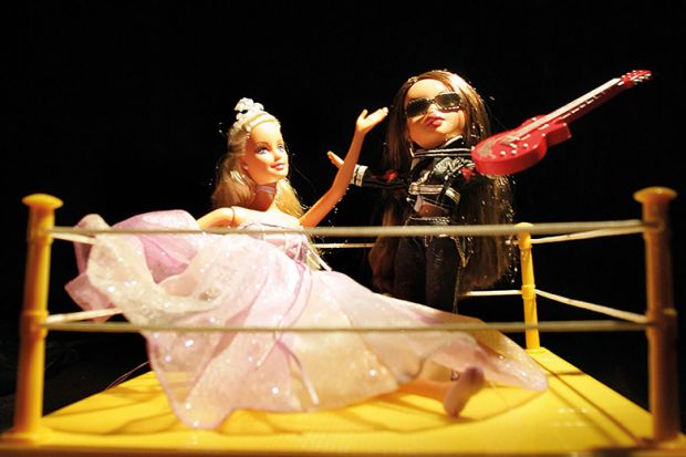 Two Barbies in boxing ring