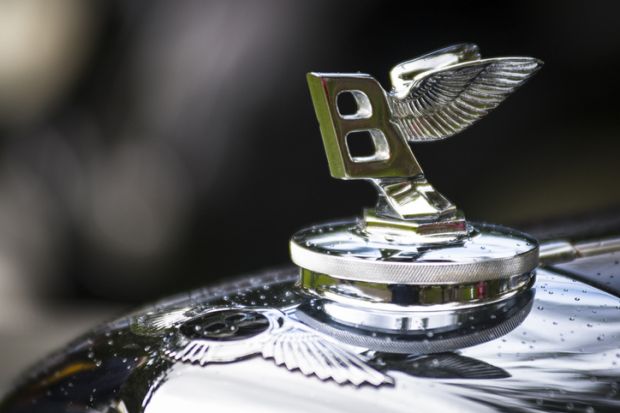 Vancouver, Сanada - May 18, 2013 Hood ornament detail from an antique Bentley automobile, seen at the annual All-British Field Meet classic and collector car event.