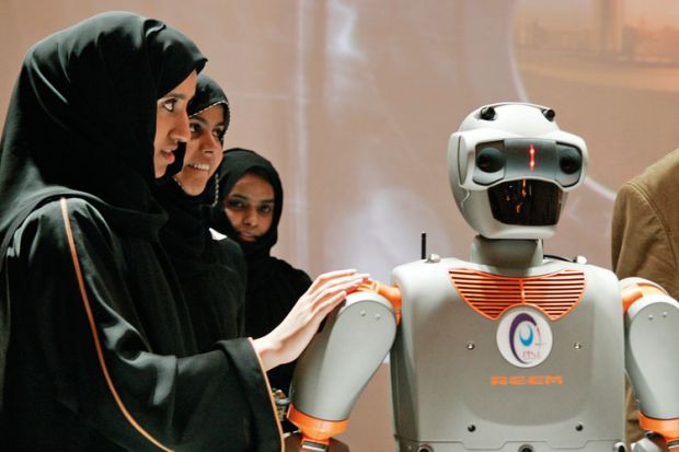 Visitors touch REEM-B robot, Pal Technology Robotics, Abu Dhabi, 2008