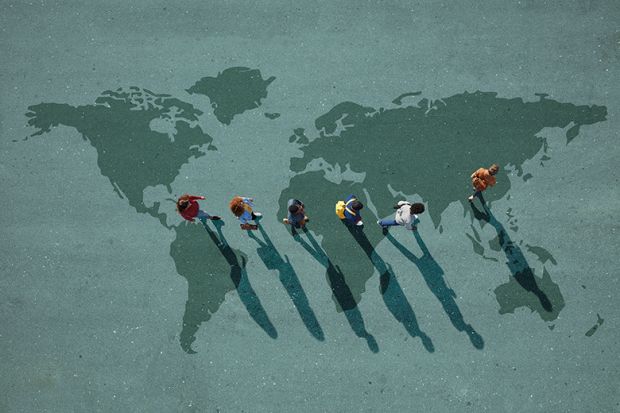 people walking on a world map