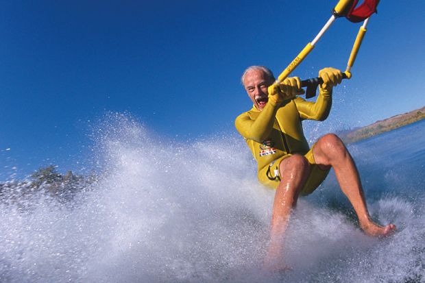 Older man waterskis