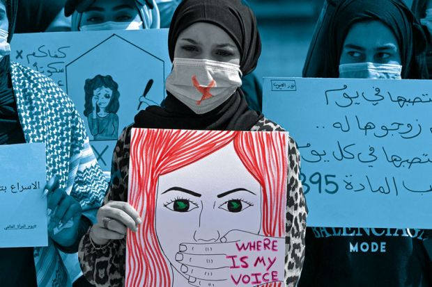 Demonstrators wearing cross-out masks attend a rally for International Women's Day in Iraq to illustrate Life still trumps work for female researchers in the Middle East