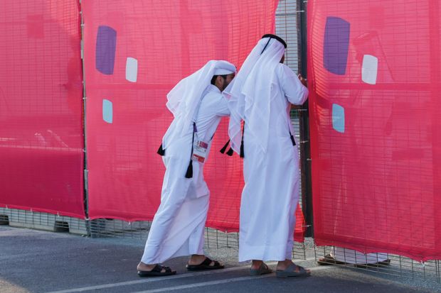 Locals try opening a shut gate to illustrate Heavy-handed Gulf regulation ‘holds back student employability’
