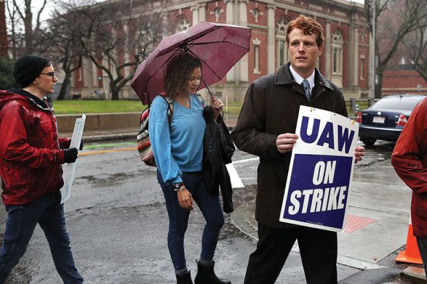 U.S. Representative Joe Kennedy lll walks the picket line with Harvard University graduate students to illustrate US colleges hit by wave of student labour unionization
