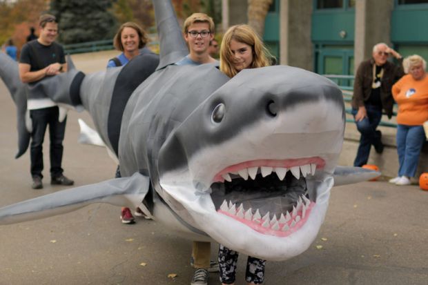 People inside a shark costume