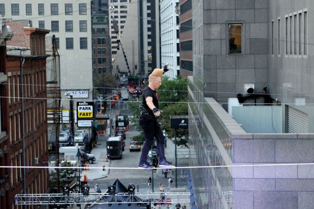 Bello Nock walks the high-wire at the South Street Seaport to illustrate Colleges tread carefully as race becomes admissions essays focus