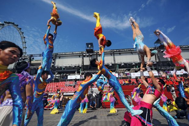 Chinese performers participated in a media preview of the Chingay Parade in Singapore to illustrate Singapore’s creative economy gets boost from new arts university 