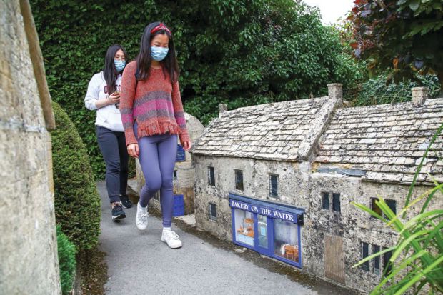 Visitors wearing a face mask  during their visit to the re-opened Model Village for UK quarantine capacity for red-list arrivals risks being ‘overwhelmed’
