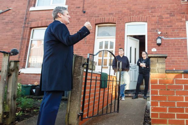 Labour leader Sir Keir Starmer meets residents standing alone outside their front door as a metaphor for ‘Like Labour, scholars are disconnected from society’.