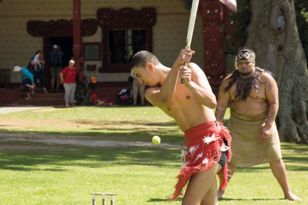 Maori men playing cricket at Waitangi New Zealand