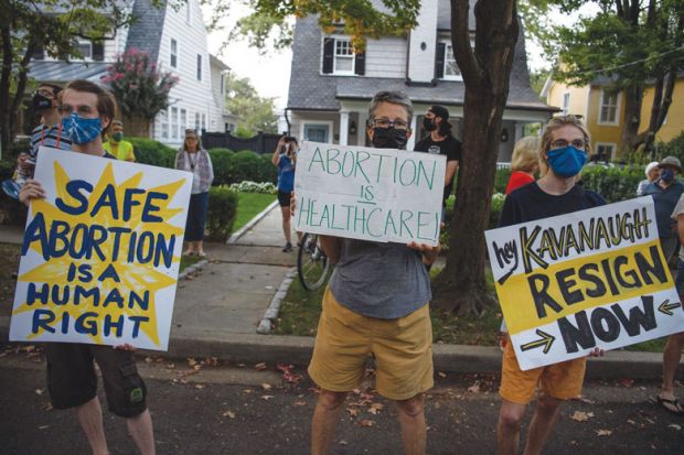 Abortion rights activists protest outside the house of US Supreme Court Justice Brett Kavanaugh in  Chevy Chase Maryland, on September 13, 2021 as illustrated for the Abortion ban to hurt Texas’ universities