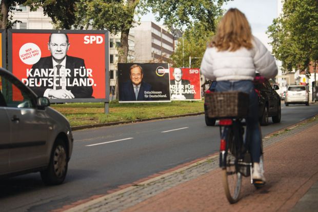 Election campaign billboards showing Olaf Scholz, chancellor candidate of the German Social Democrats (SPD), and Armin Laschet, chancellor candidate of the Christian Democrats (CDU/CSU) illustrating the current election campaign