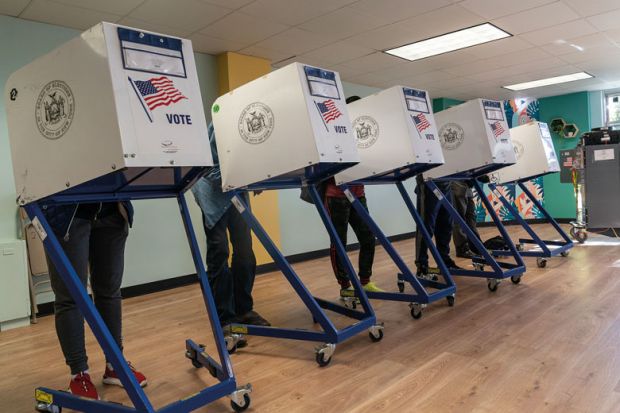  People seen voting at a polling station in the Bronx on election day to illustrate hope for US reforms as student voters make voices heard in midterms