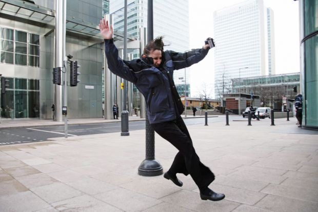 Woman caught in gust of wind