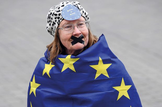 Woman wrapped in EU flag
