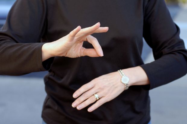 Woman using sign language