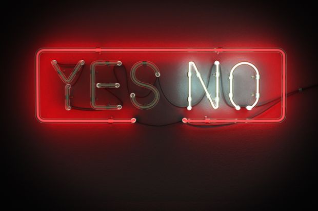Yes or No sign made from neon alphabet on a black background