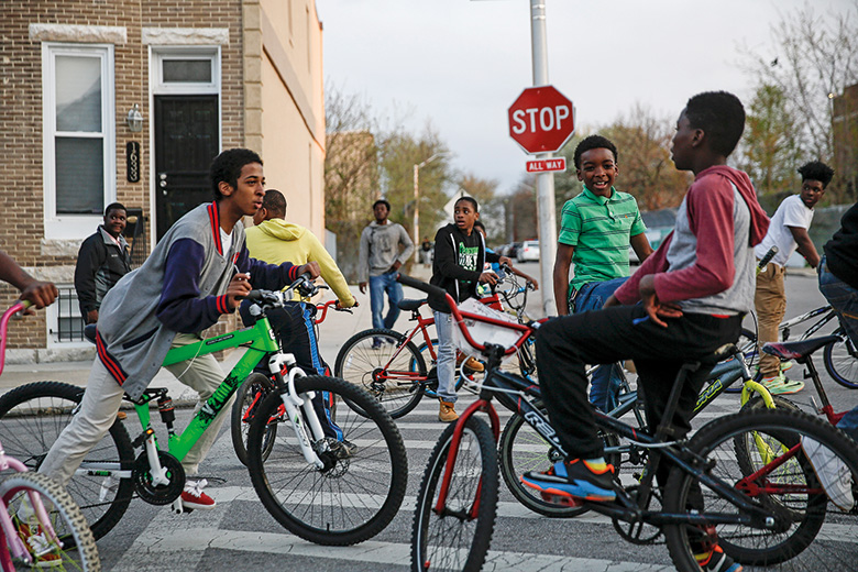 Children on bikes in Baltimore