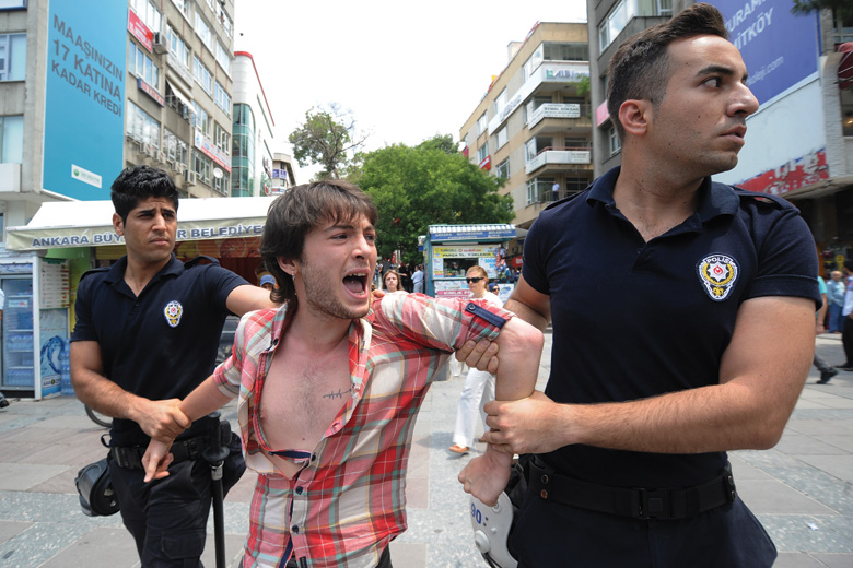 Turkish police detain student protesting against AKP government's education policy