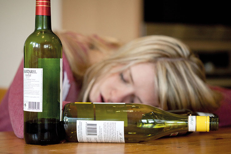 Woman passed out from drinking wine